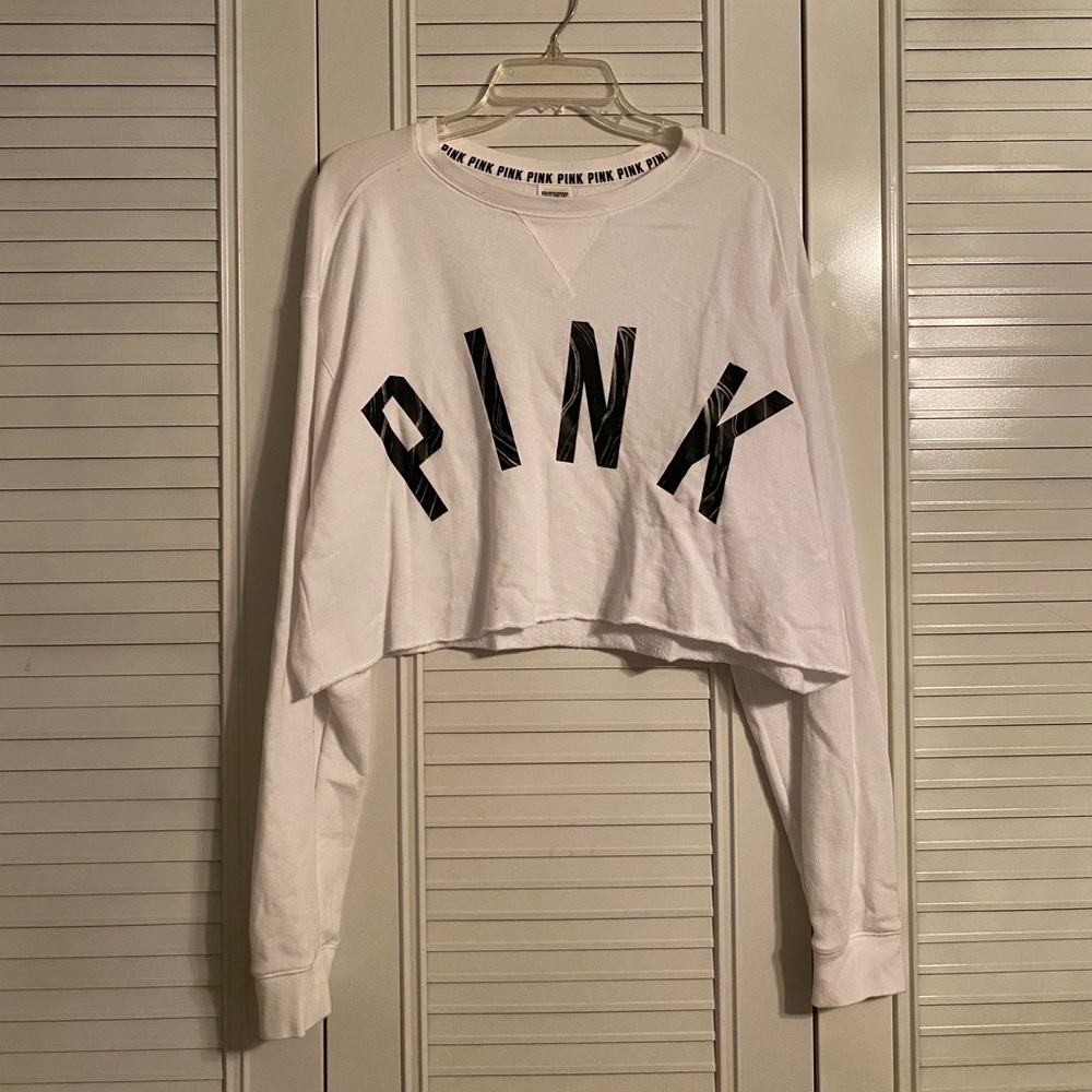 VS PINK white cropped comfy top. Small stain on sleeve. Price discounted.